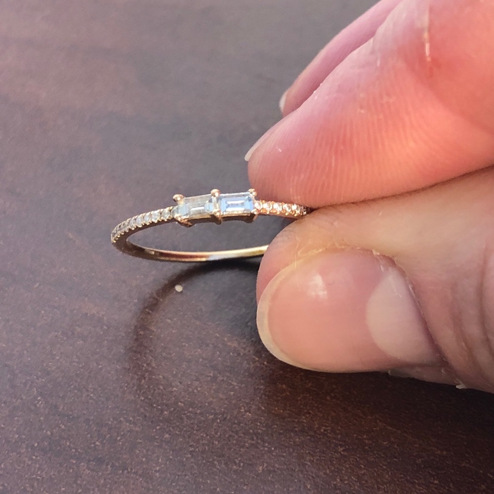 Stackable diamond baguette ring in rose gold.